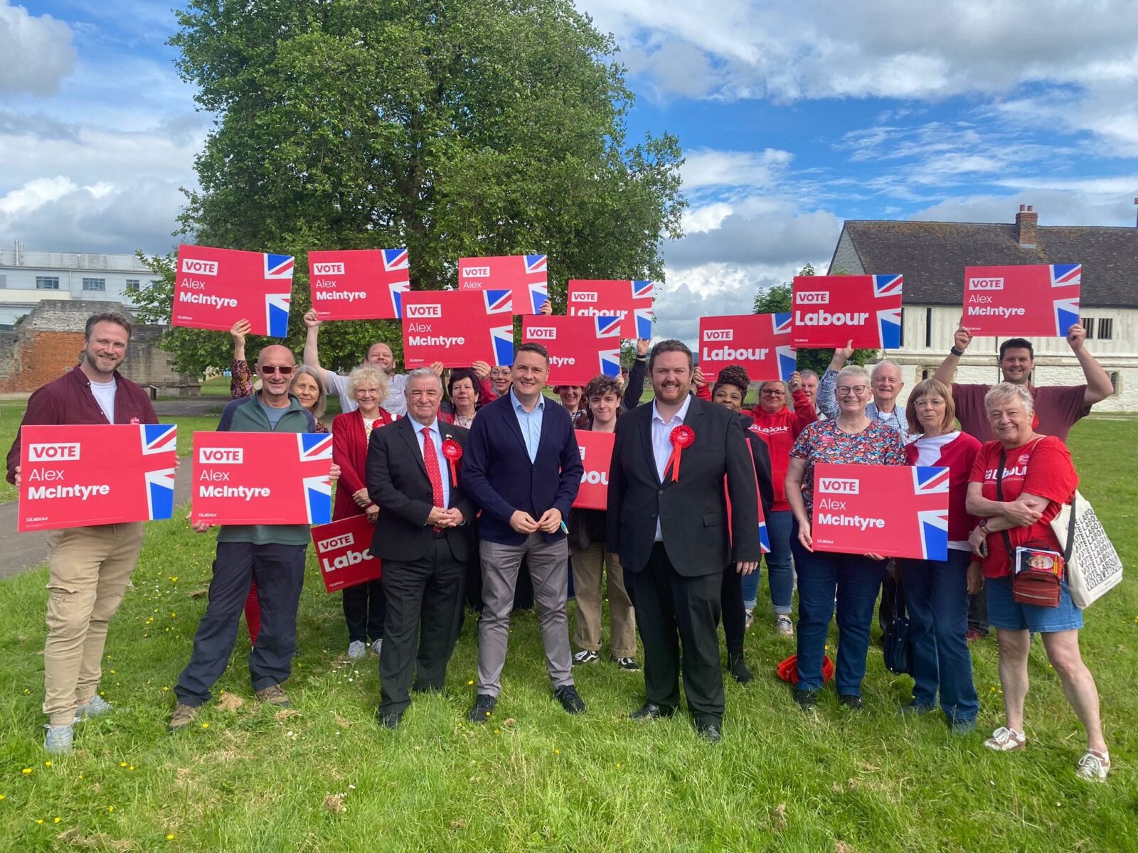Wes Streeting and Alex McIntyre standing with Labour Party activists